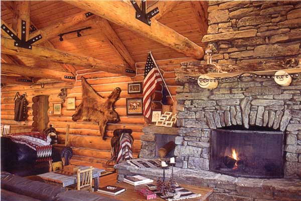 The interior of the lodge features a beautiful rock fireplace